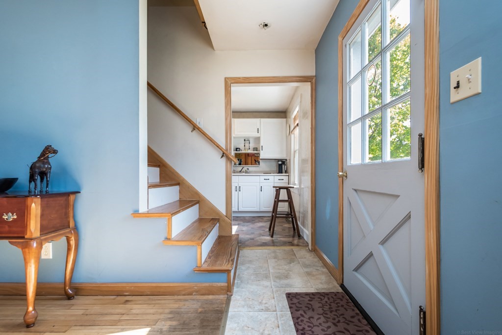 56 Ayer Road Shirley, MA 01464 - Photo 5 of 41 a view of entryway and hall with wooden floor