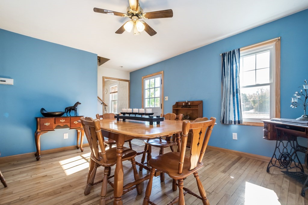 56 Ayer Road Shirley, MA 01464 - Photo 8 of 41 a view of a dining room with furniture window and wooden floor