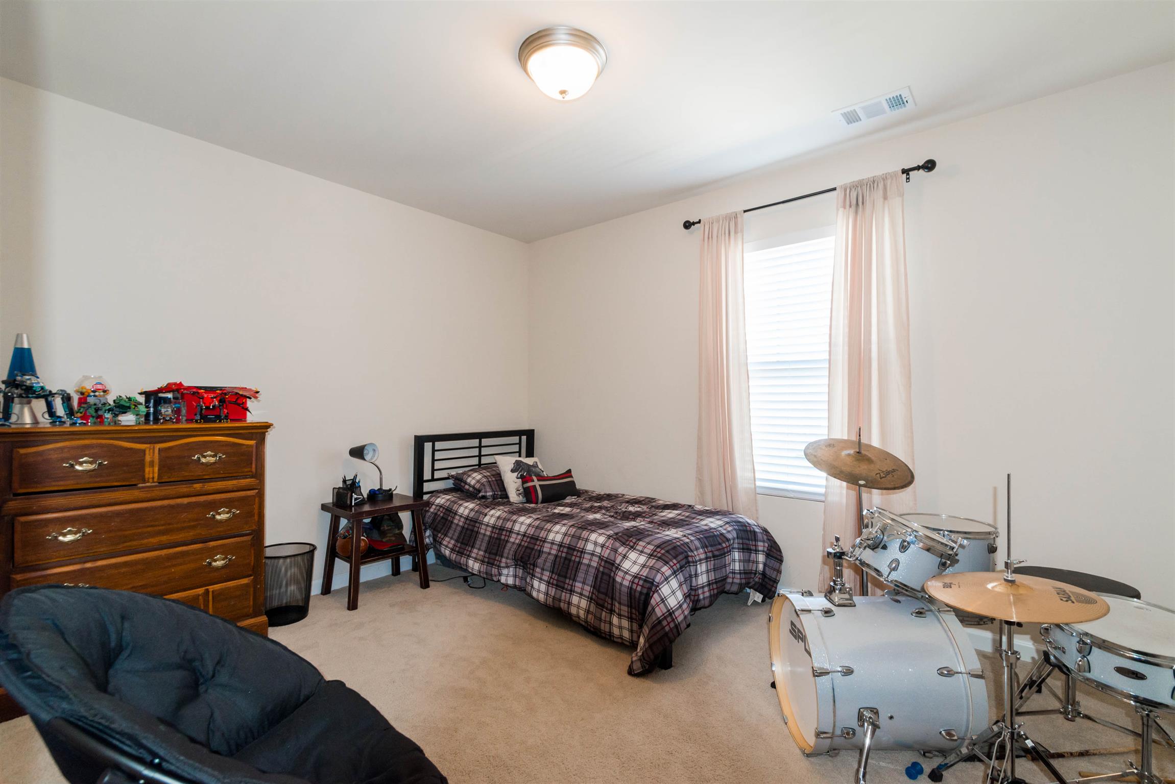 1448 Old Stone Road Lebanon, TN 37087 - Photo 18 of 25 a bedroom with furniture and a window