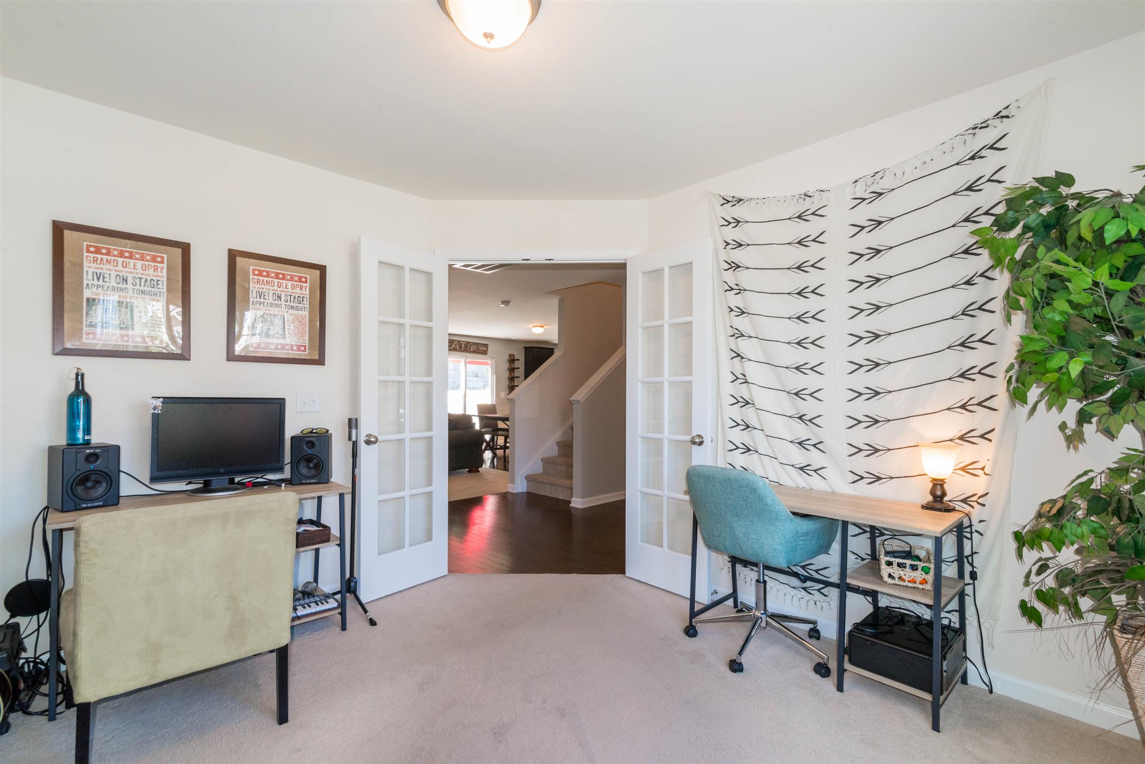 1448 Old Stone Road Lebanon, TN 37087 - Photo 5 of 25 a living room with furniture and a flat screen tv