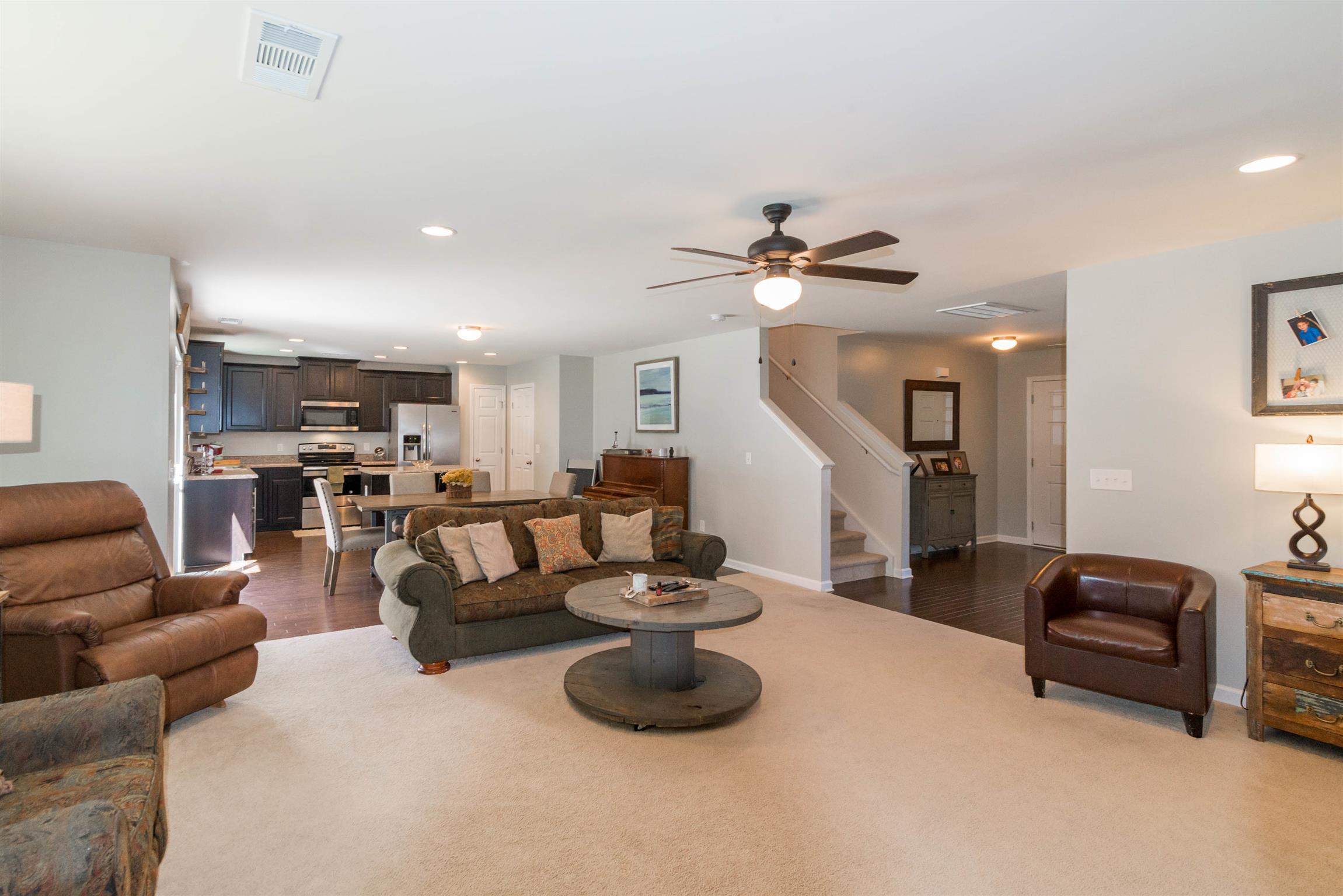 1448 Old Stone Road Lebanon, TN 37087 - Photo 7 of 25 a living room with furniture and a view of kitchen