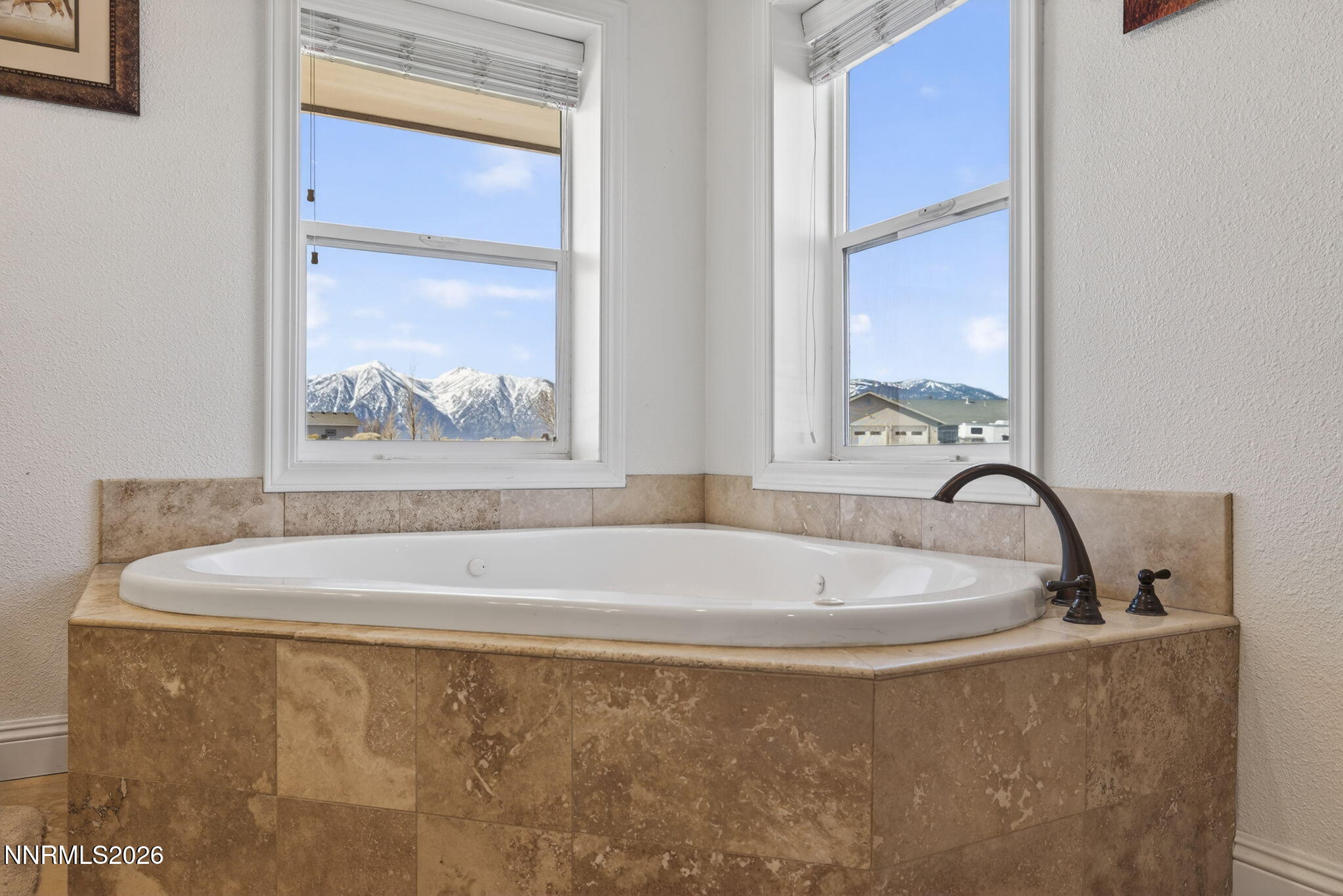 1720 North Benton Road Minden, NV 89423 - Photo 23 of 46 a bath tub sitting next to a window