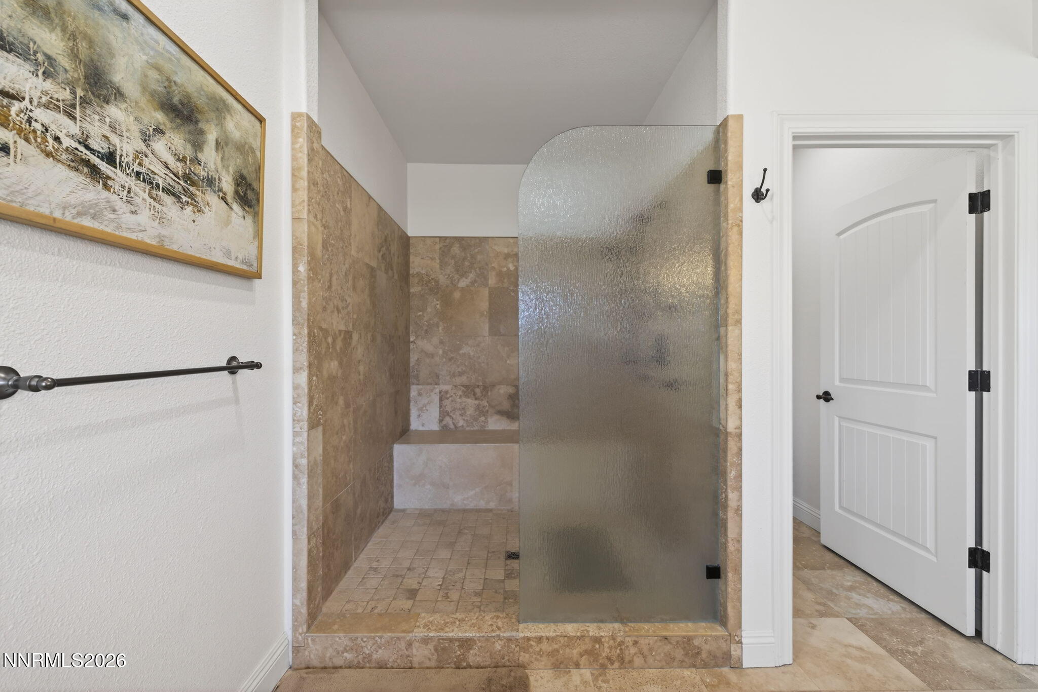 1720 North Benton Road Minden, NV 89423 - Photo 24 of 46 a bathroom with a glass shower door