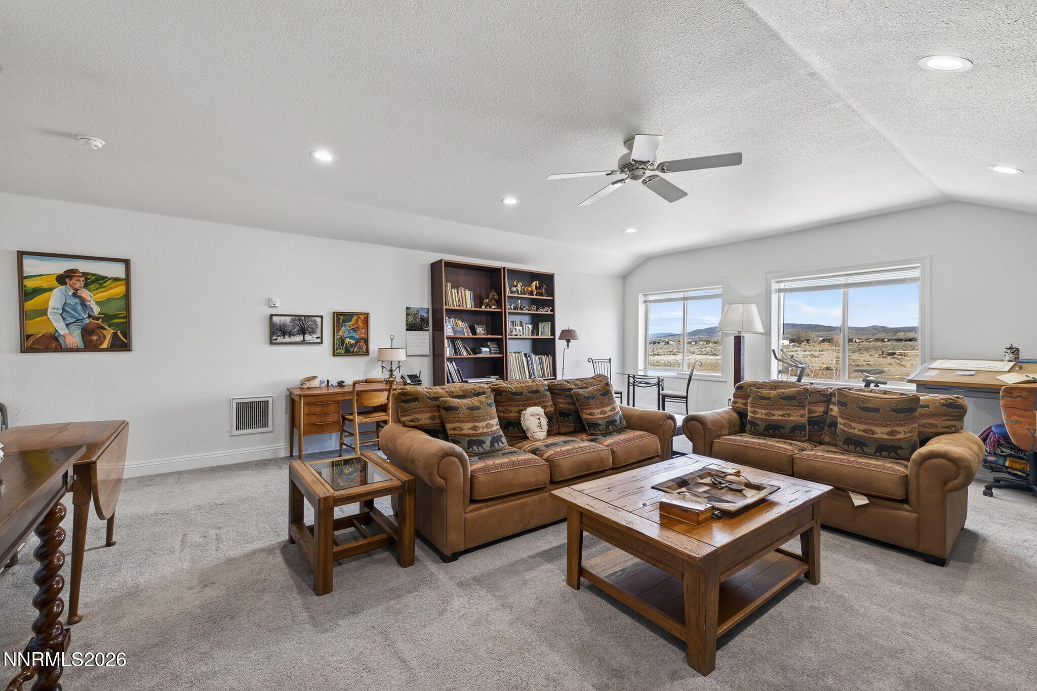 1720 North Benton Road Minden, NV 89423 - Photo 28 of 46 a living room with furniture and a ceiling fan
