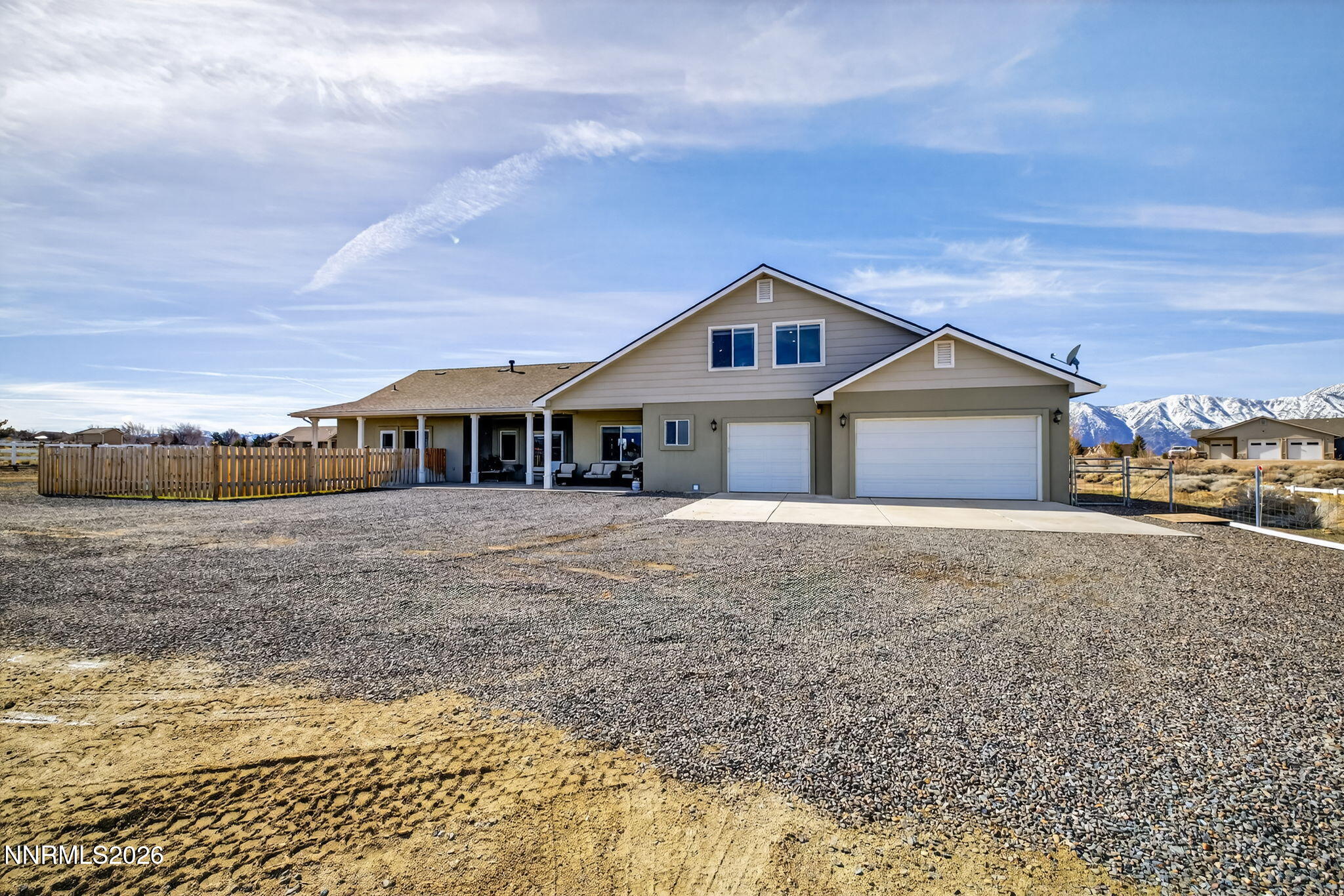 1720 North Benton Road Minden, NV 89423 - Photo 42 of 46 a front view of a house with a yard