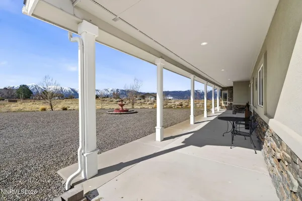 a kitchen with stainless steel appliances granite countertop a refrigerator stove and oven