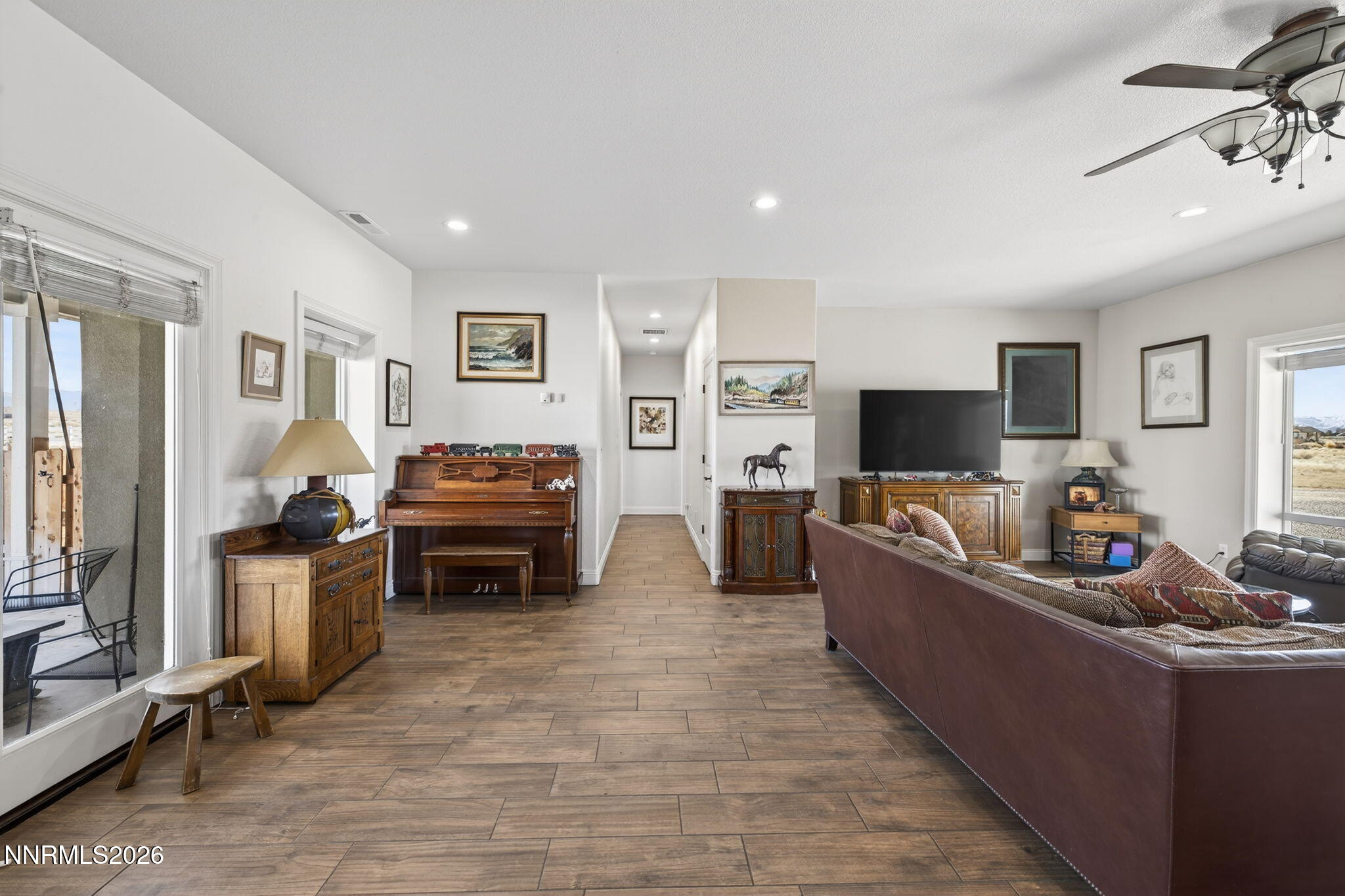1720 North Benton Road Minden, NV 89423 - Photo 10 of 46 a living room with furniture and a flat screen tv