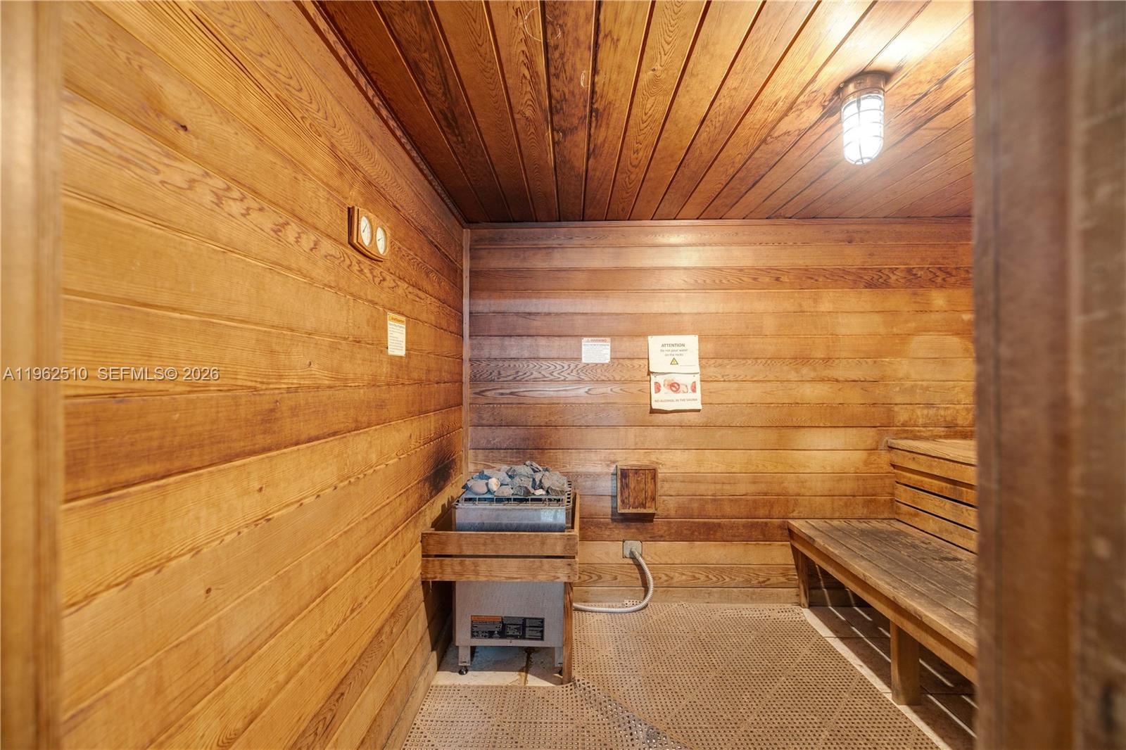 16750 Northeast 14th Avenue, Unit 308 Miami, FL 33162 - Photo 24 of 29 a bathroom with a shower