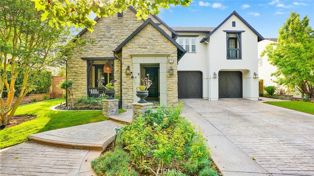 19 Basilica Place Ladera Ranch, CA 92694 - Photo 1 of 1 a front view of a house with garden