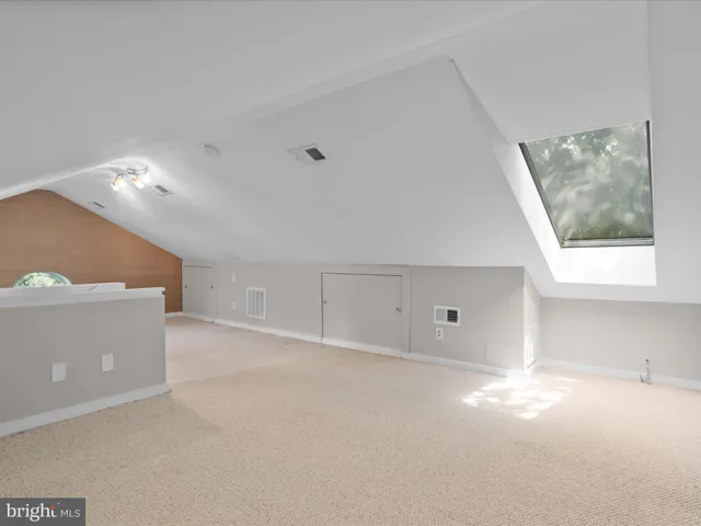 a view of a room with racks on the wall