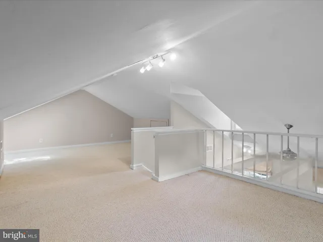 a view of a building with sitting area