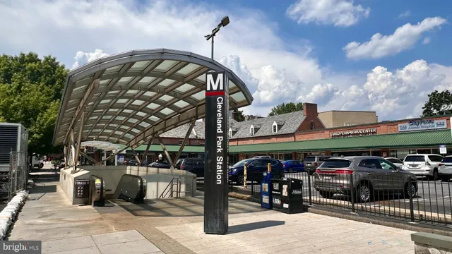 a view of a cafe with sitting area