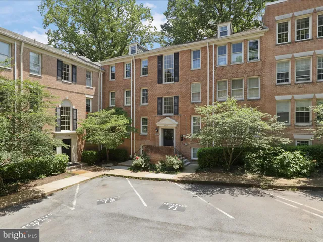 a front view of a house with yard