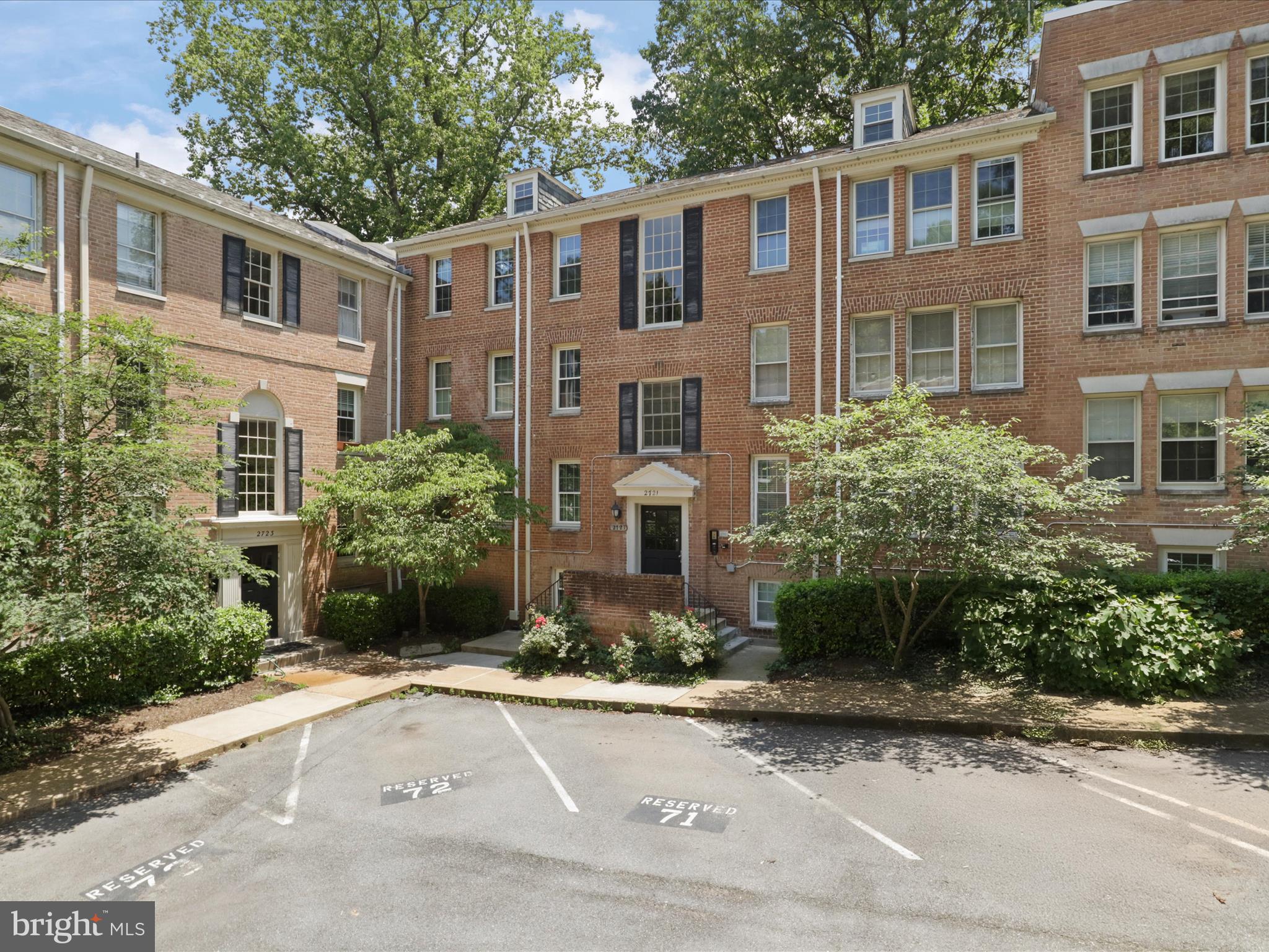 2721 Ordway Street Northwest, Unit 5 Washington, DC 20008 - Photo 3 of 39 a front view of a house with yard