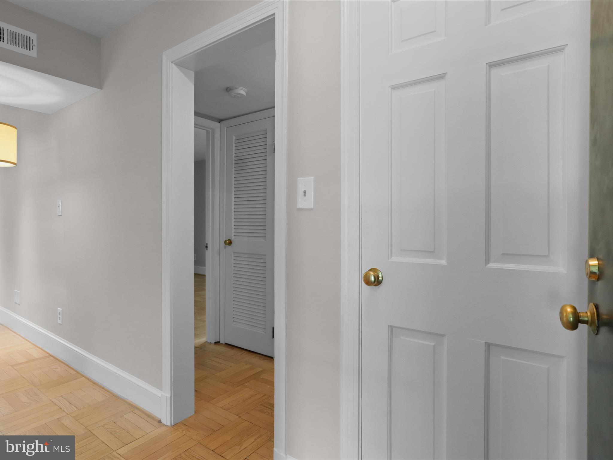 2721 Ordway Street Northwest, Unit 5 Washington, DC 20008 - Photo 7 of 39 a view of a hallway with wooden floor