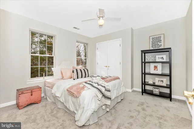 a view of a chairs and table under an umbrella