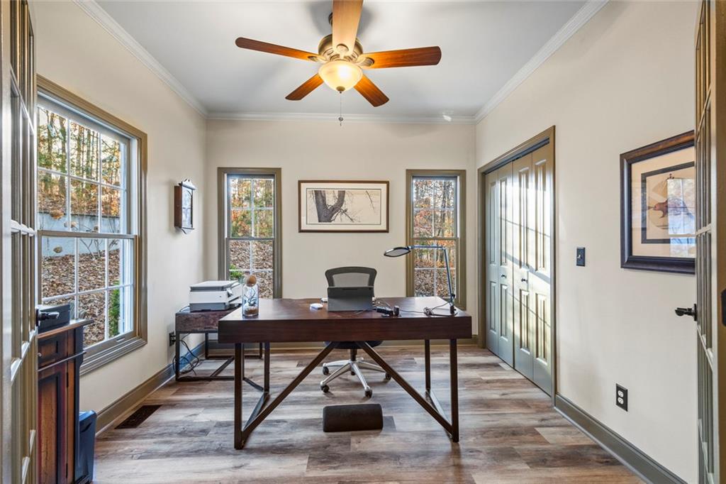 152 Chapman Manor Drive Martin, GA 30557 - Photo 13 of 90 a workspace with wooden floor and a window