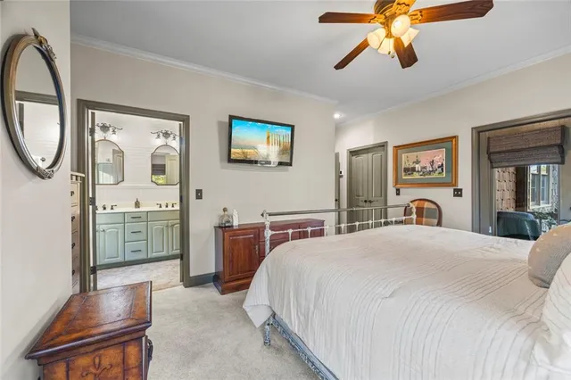 a kitchen with stainless steel appliances granite countertop a sink and a large window