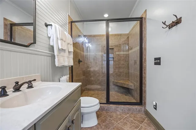 a living room with stainless steel appliances kitchen island granite countertop furniture and a kitchen view