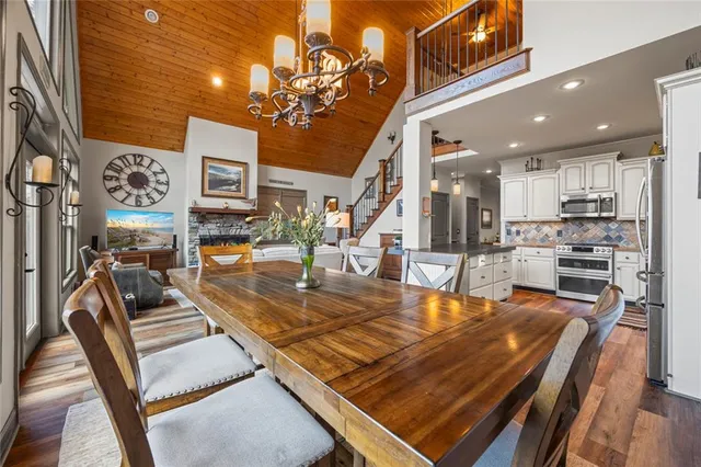 a bed room with a bed and a chandelier