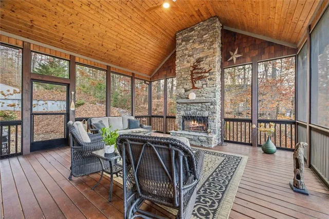 a view of a patio with a table and chairs