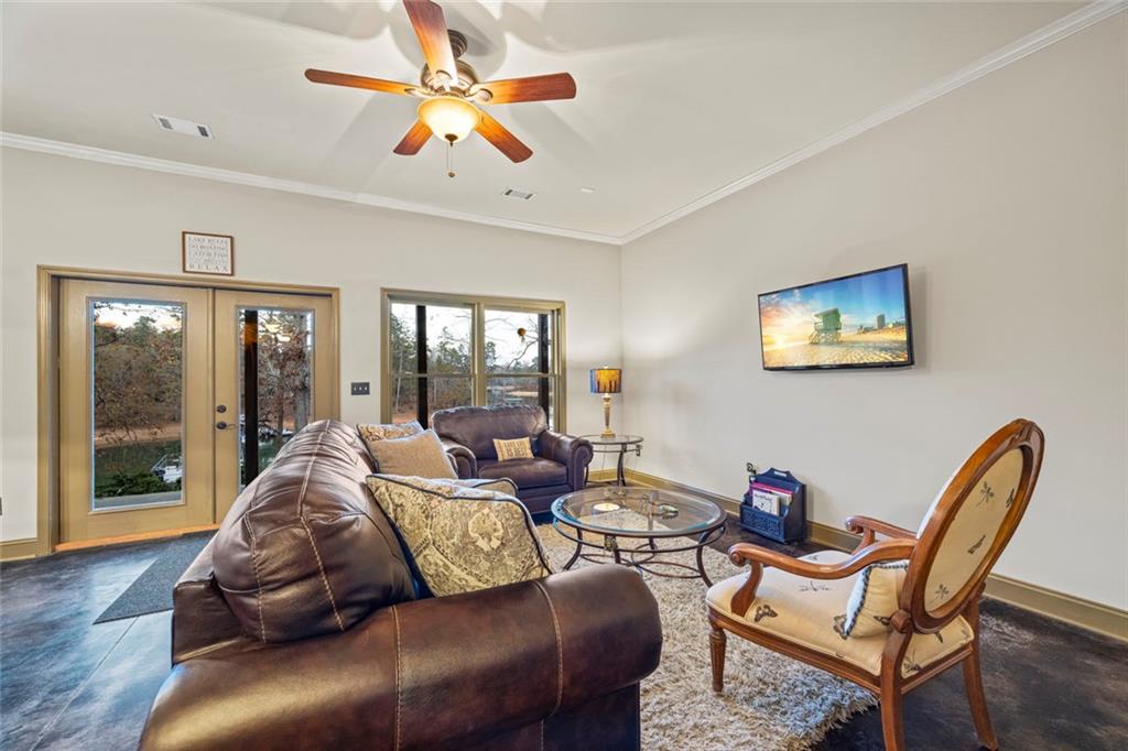 152 Chapman Manor Drive Martin, GA 30557 - Photo 68 of 90 a living room with furniture and a large window