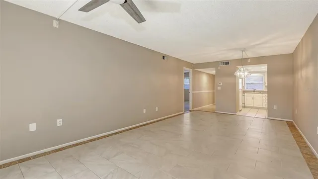 a view of an empty room and window
