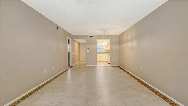 a kitchen with granite countertop cabinets stainless steel appliances and a sink