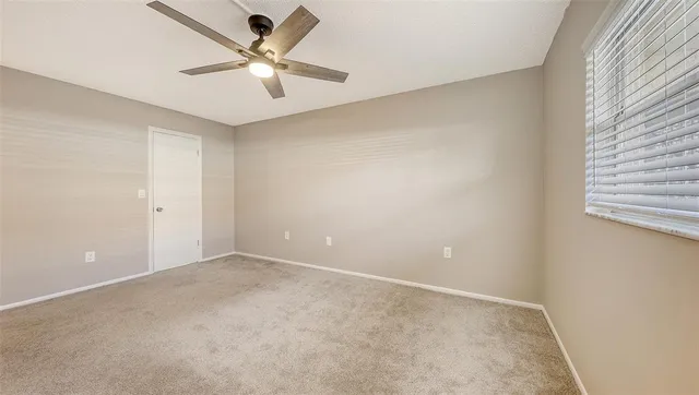 a view of a storage & utility room with a sink