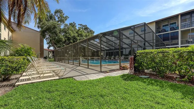 a view of a balcony with car parked