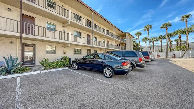 a car parked in front of a building