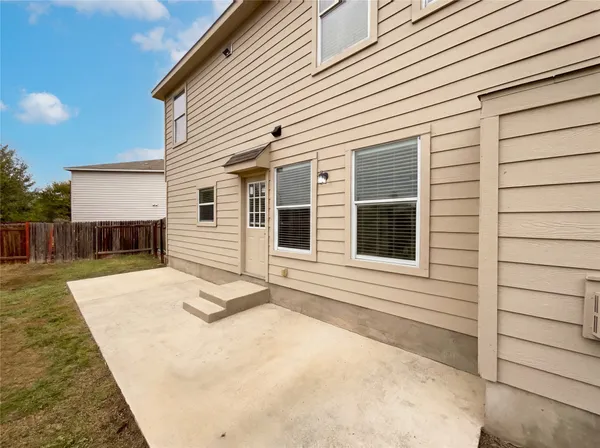 a view of a house with a patio