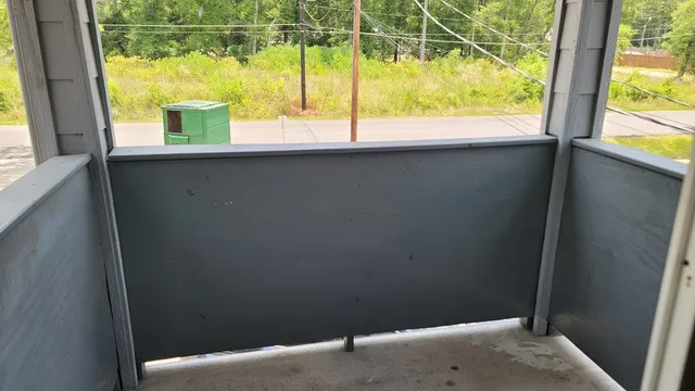 a view of a sink and a window