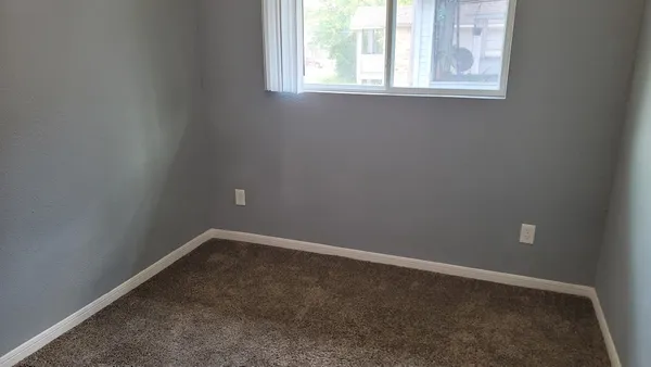 an empty room with a window