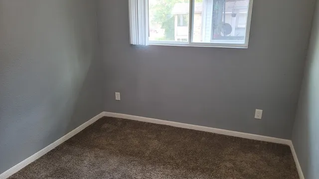 an empty room with a window