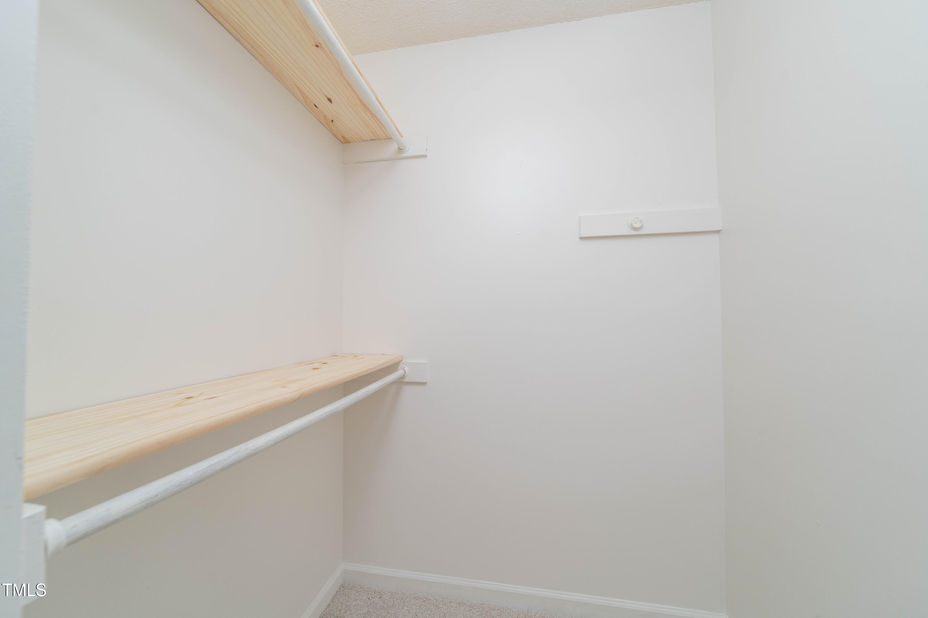 4258 Kaplan Drive Raleigh, NC 27606 - Photo 18 of 20 a view of small space with empty racks