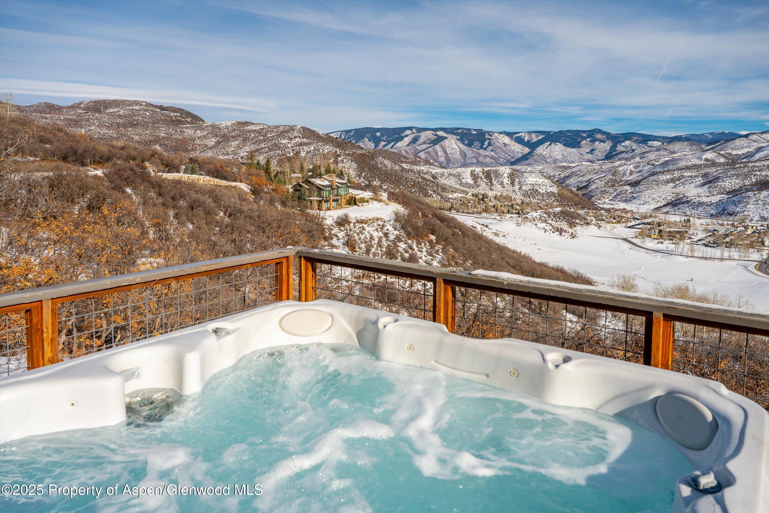328 Oak Ridge Road Snowmass Village, CO 81615 - Photo 25 of 44 a view of a balcony with an ocean view