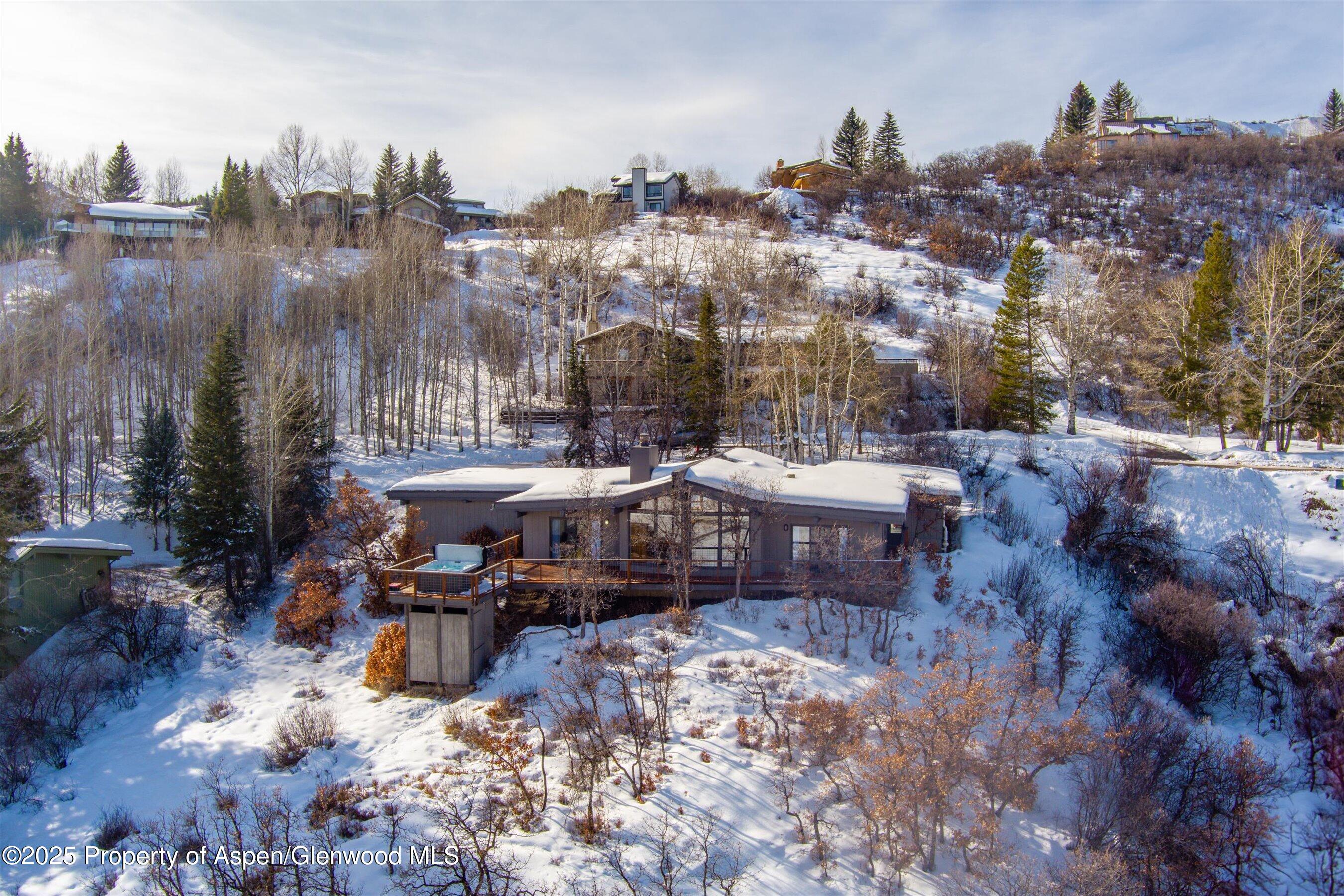 328 Oak Ridge Road Snowmass Village, CO 81615 - Photo 7 of 44 a view of a city with sitting area