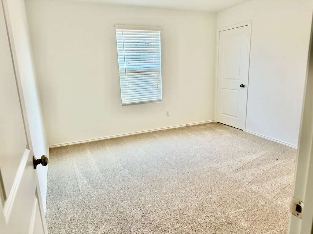 4104 Home Pl Road Georgetown, TX 78628 - Photo 18 of 35 Spare room with light carpet