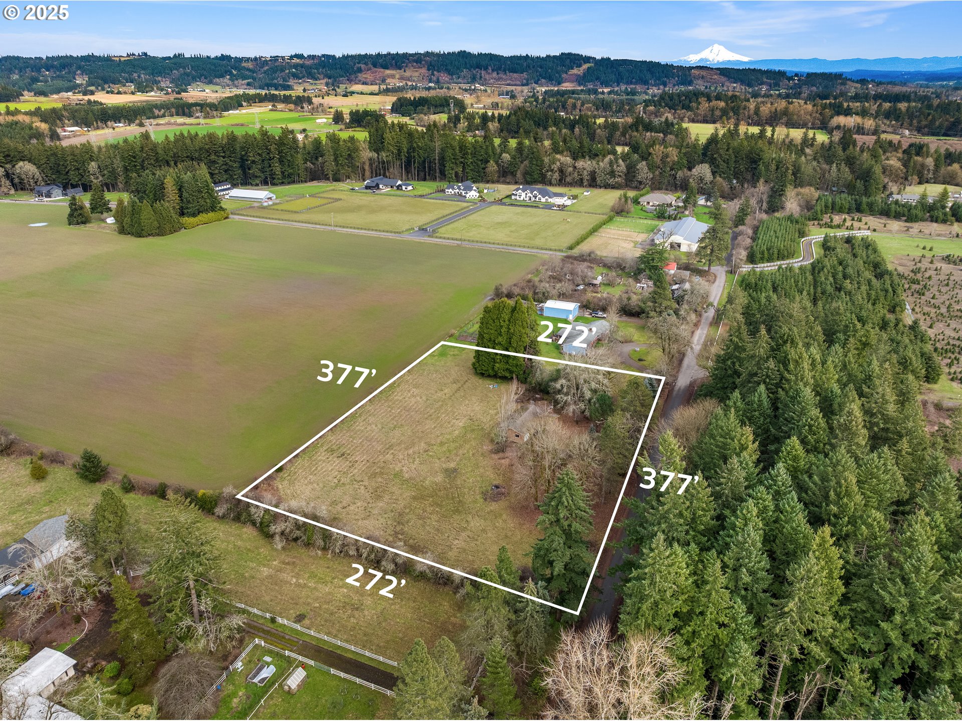 5565 Southwest Kruse Road Wilsonville, OR 97070 - Photo 9 of 13 an aerial view of a house with a lake view