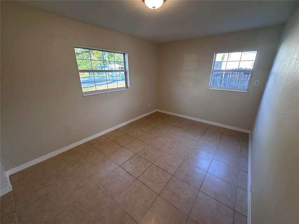5772 94th Avenue Pinellas Park, FL 33782 - Photo 17 of 29 an empty room with windows