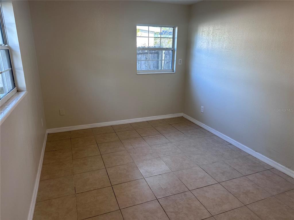 5772 94th Avenue Pinellas Park, FL 33782 - Photo 21 of 29 an empty room with windows