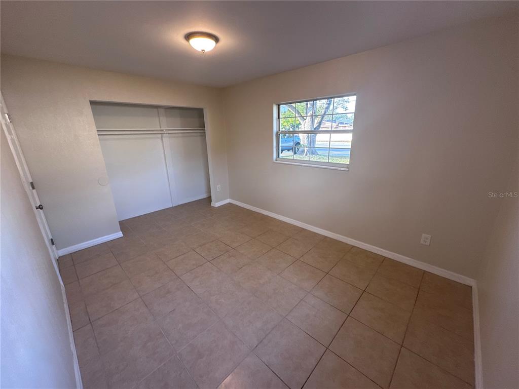 5772 94th Avenue Pinellas Park, FL 33782 - Photo 23 of 29 an empty room with windows