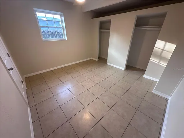 en empty room with windows