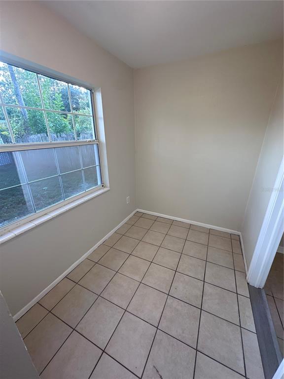 5772 94th Avenue Pinellas Park, FL 33782 - Photo 8 of 29 a view of an empty room and window