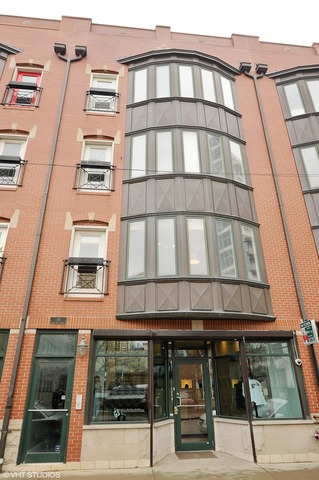 69 East 16th Street, Unit 2 Chicago, IL 60616 - Photo 1 of 16 a view of a building with a window
