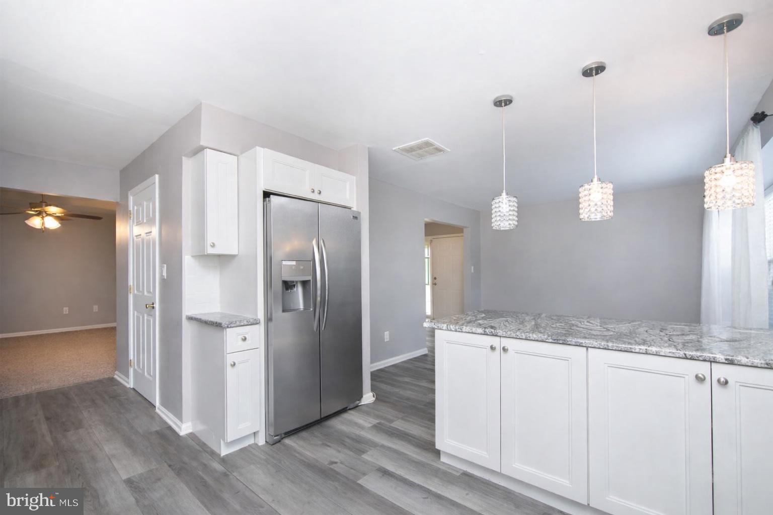 304 Coventry Way Mount Laurel, NJ 08054 - Photo 5 of 16 Kitchen and Living Room