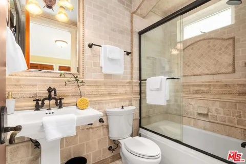 $5,195,000 | 919 South Gretna Green Way, Los Angeles, CA 90049