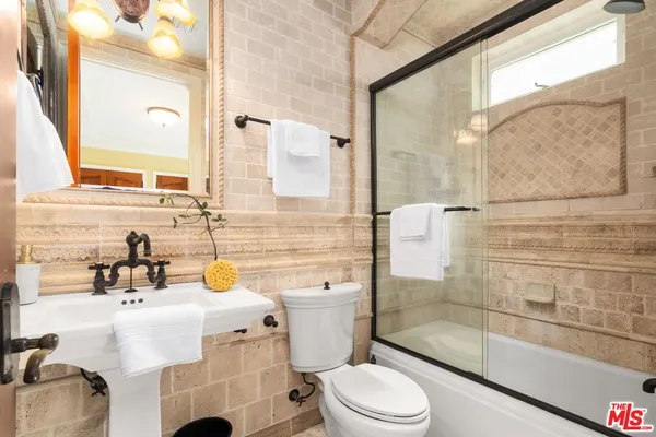 $5,195,000 | 919 South Gretna Green Way, Los Angeles, CA 90049