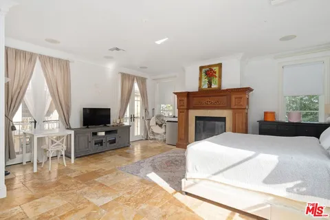 $5,195,000 | 919 South Gretna Green Way, Los Angeles, CA 90049